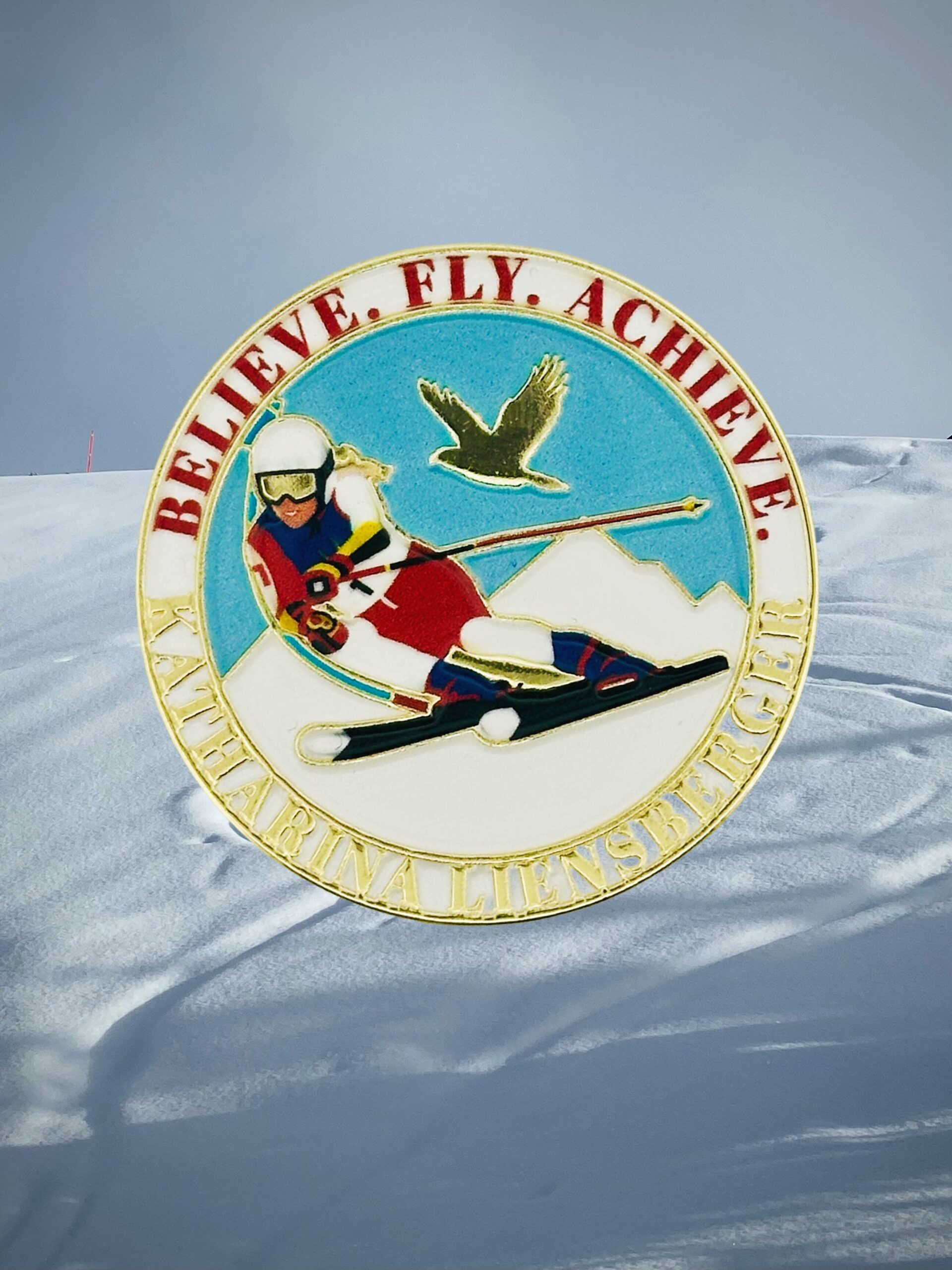 Olympic Skier Enamel Pin on a Snowy Mountain Trail